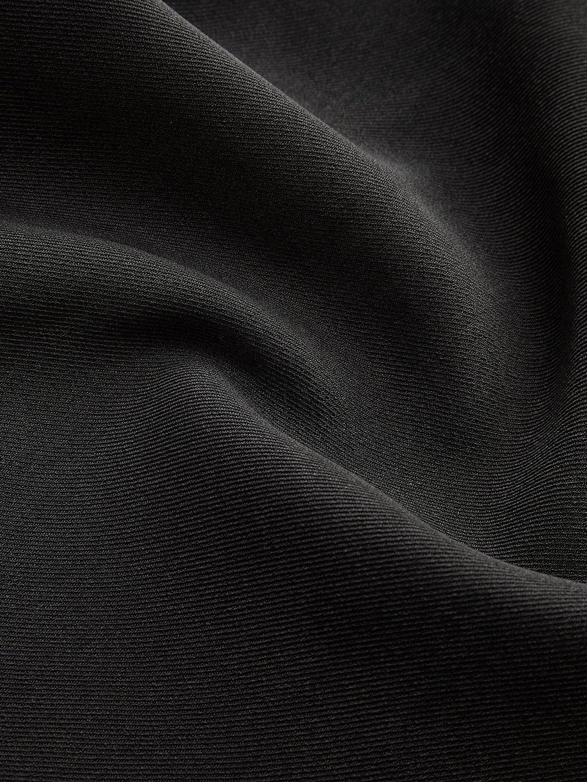 Gilet noir tendance vue de dos nuage