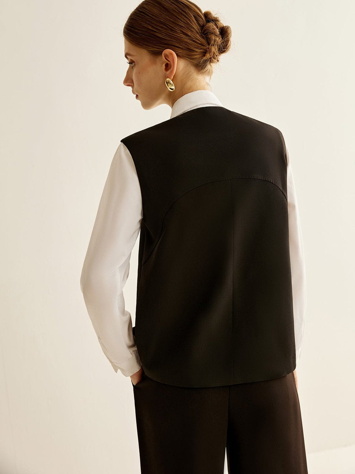 Gilet noir classique détail finition grâce