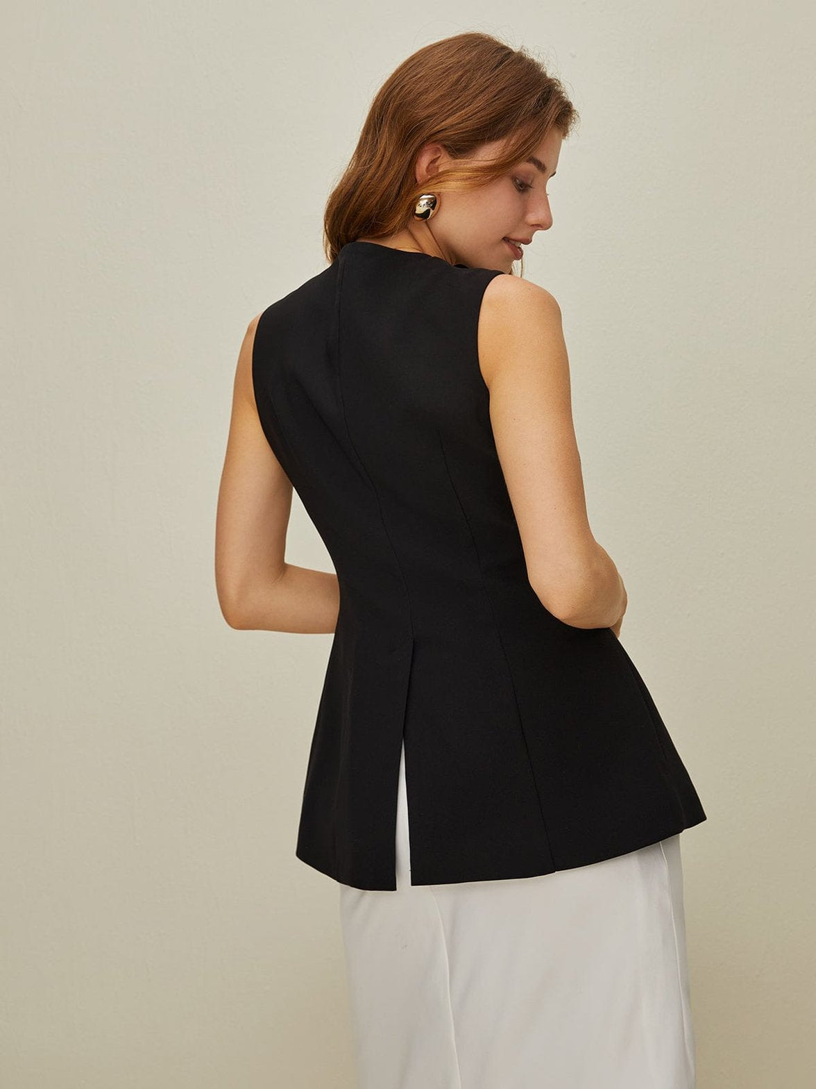 Gilet noir tendance détail finitions éclat