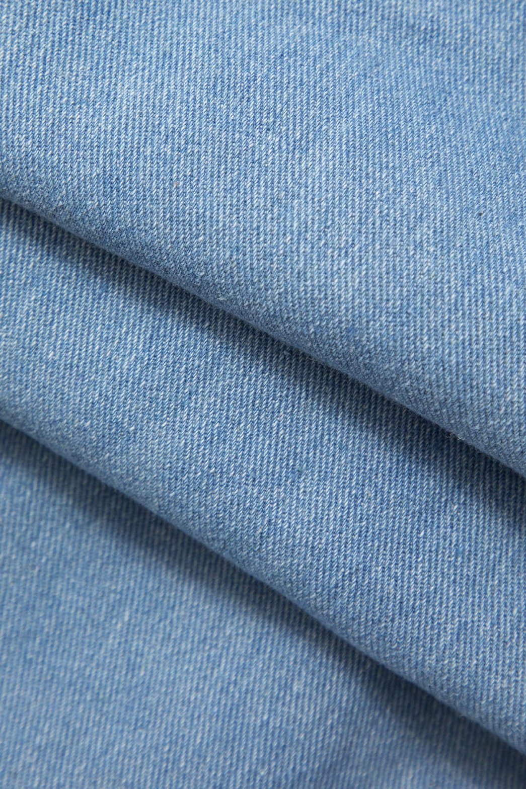 Jean cargo gris détail bouton neige