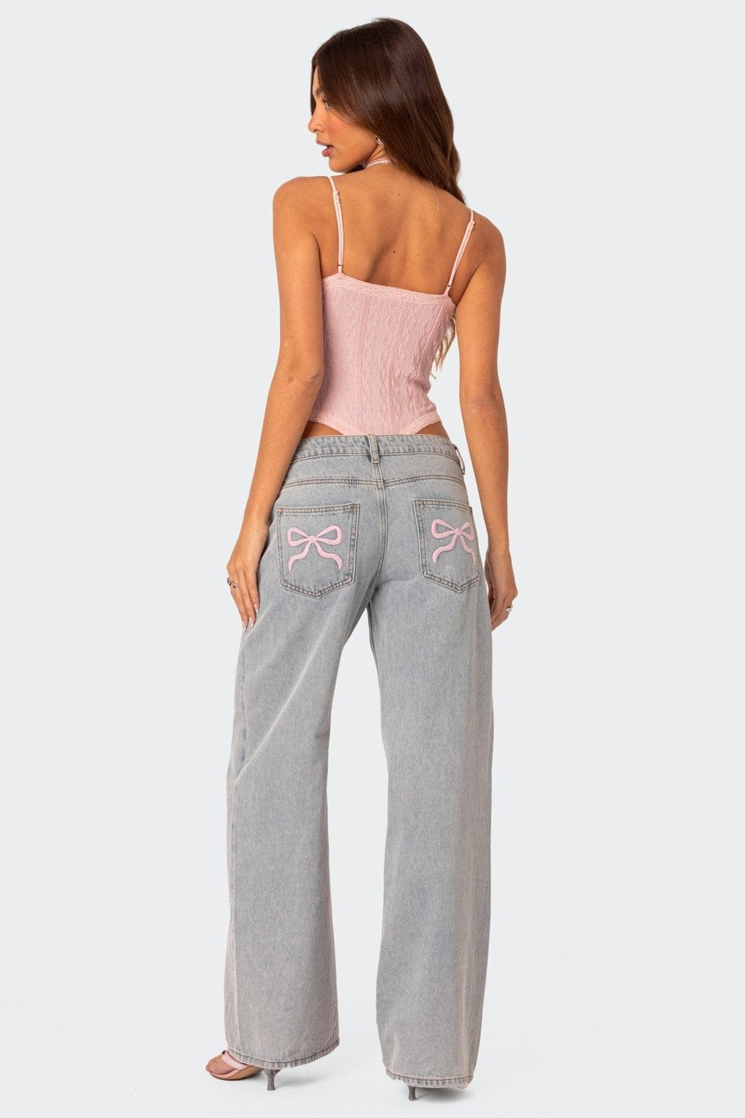 Jean large gris clair avec nœuds décoratifs papillon soleil