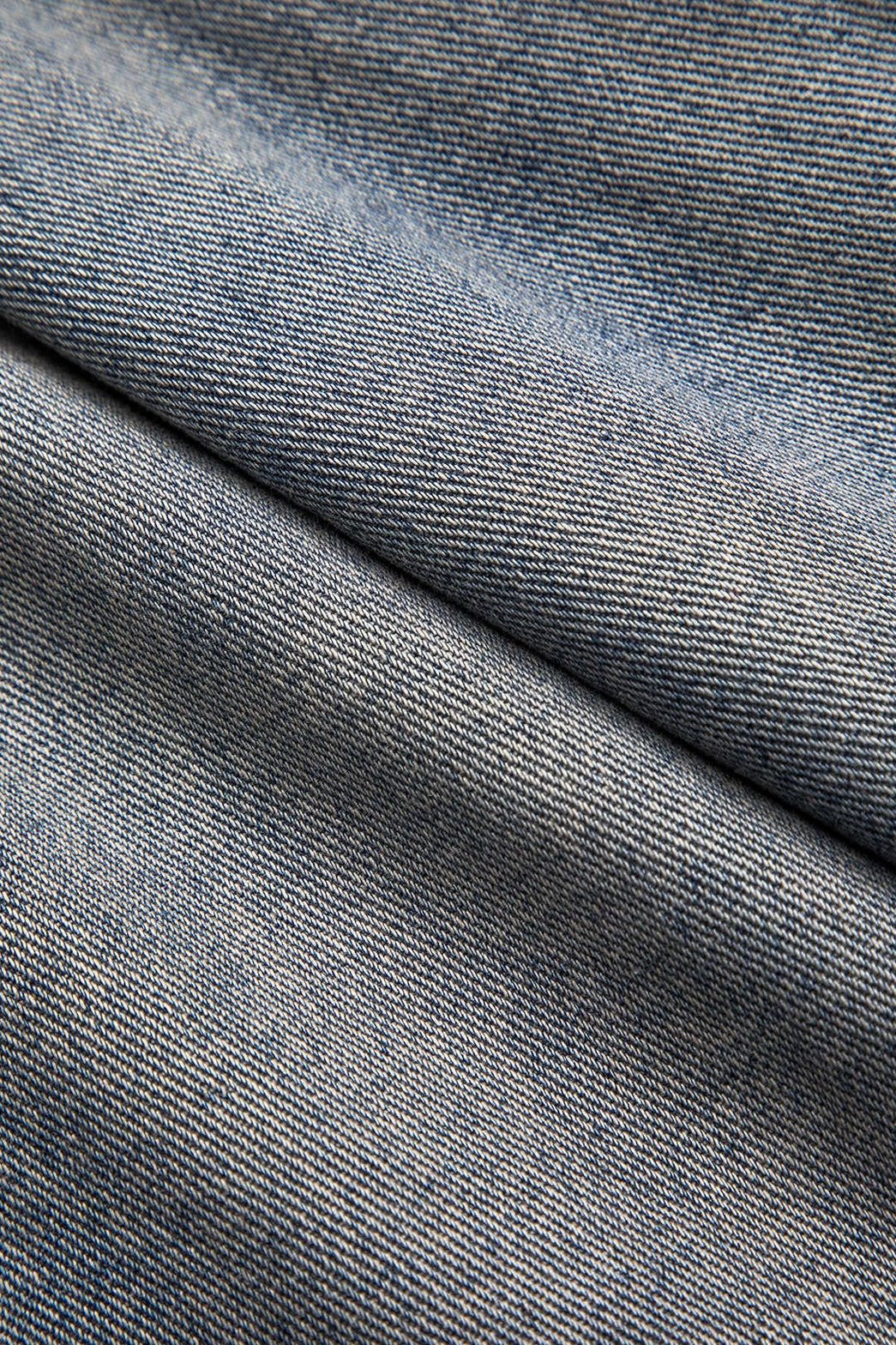 Jean patchwork détail boutons nuage