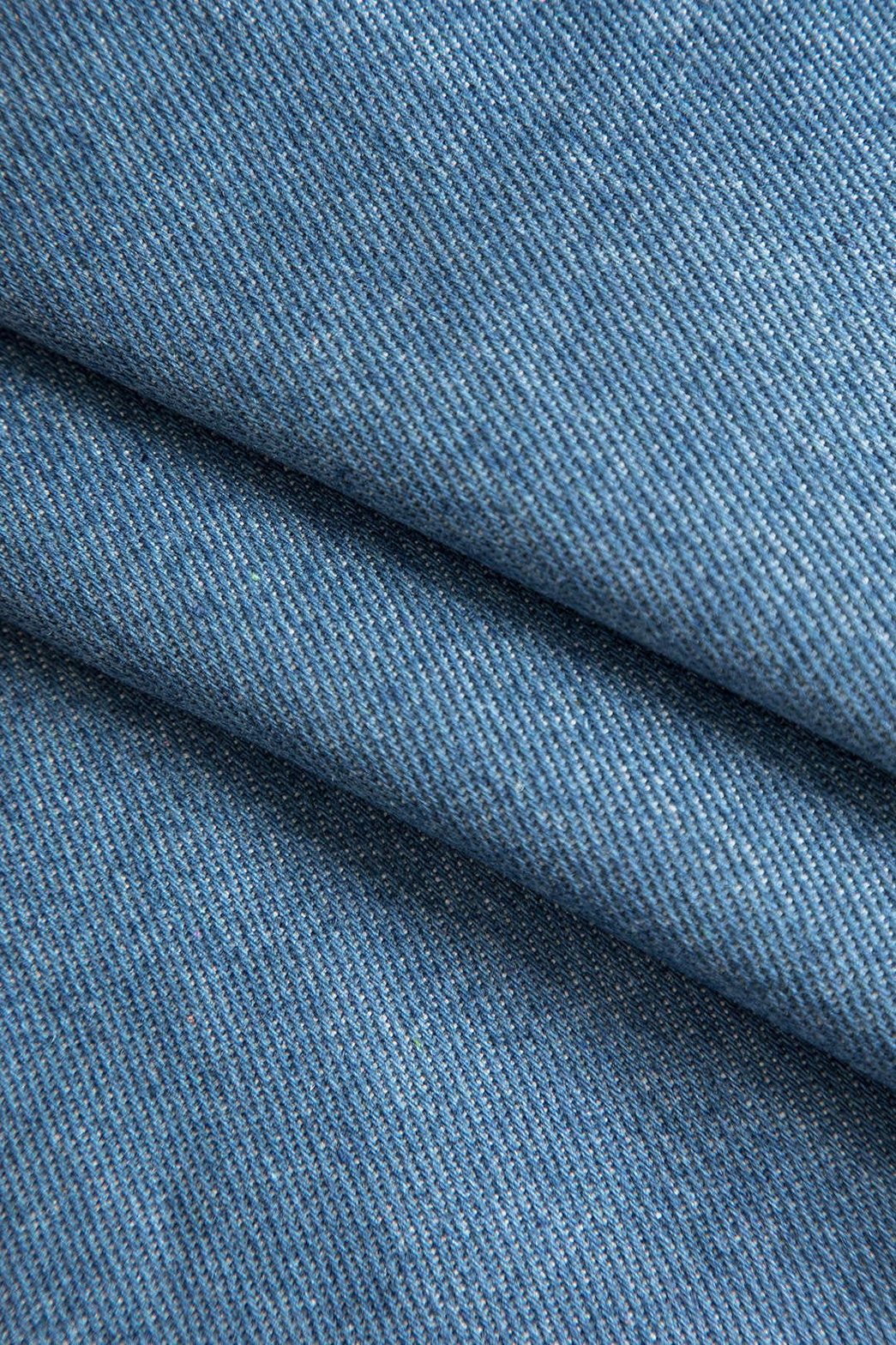 Vue arrière jupe en denim avec finitions volantées nuage