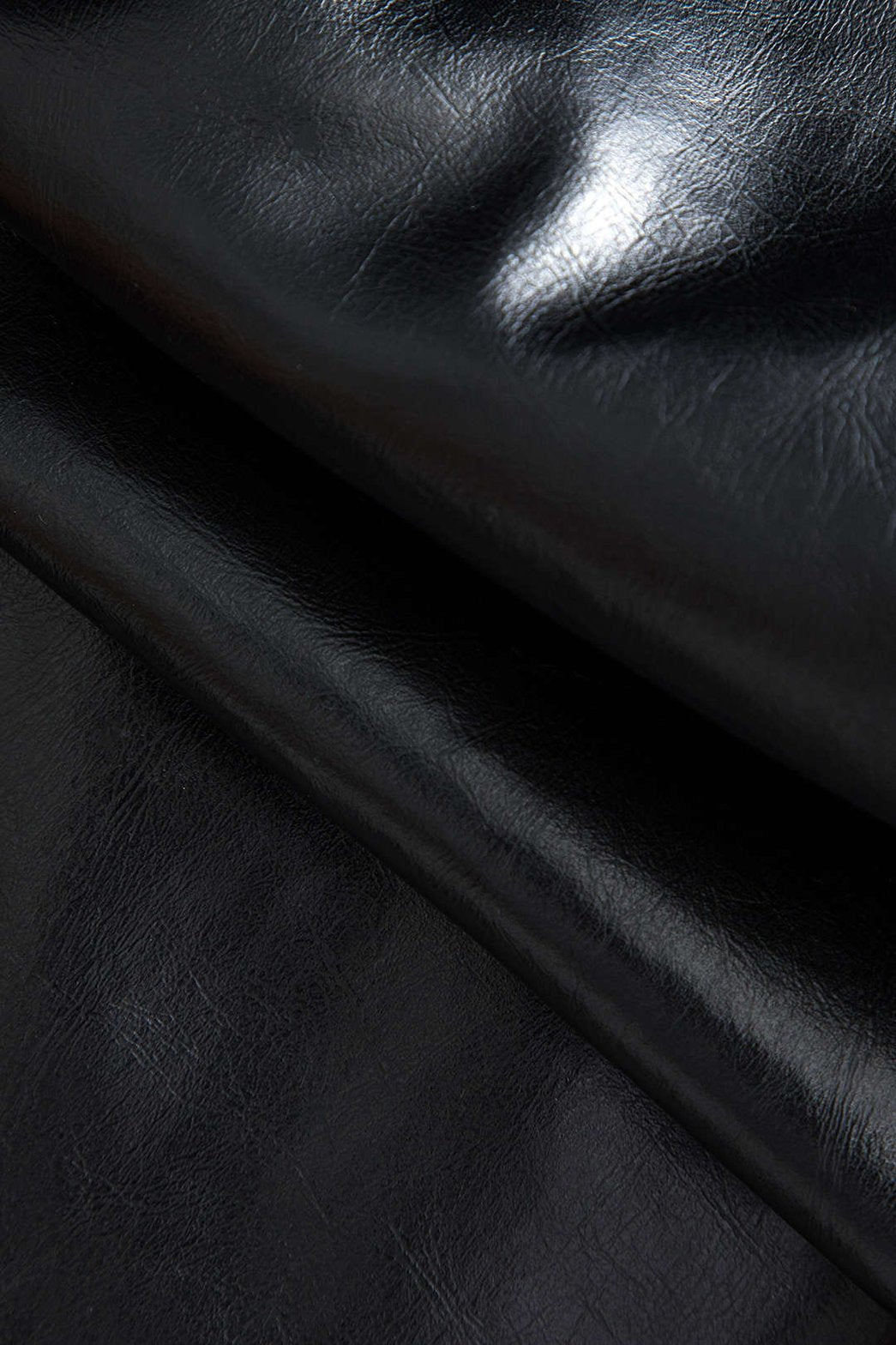 Jupe plissée bimatière cuir et lin noir élégant étoile