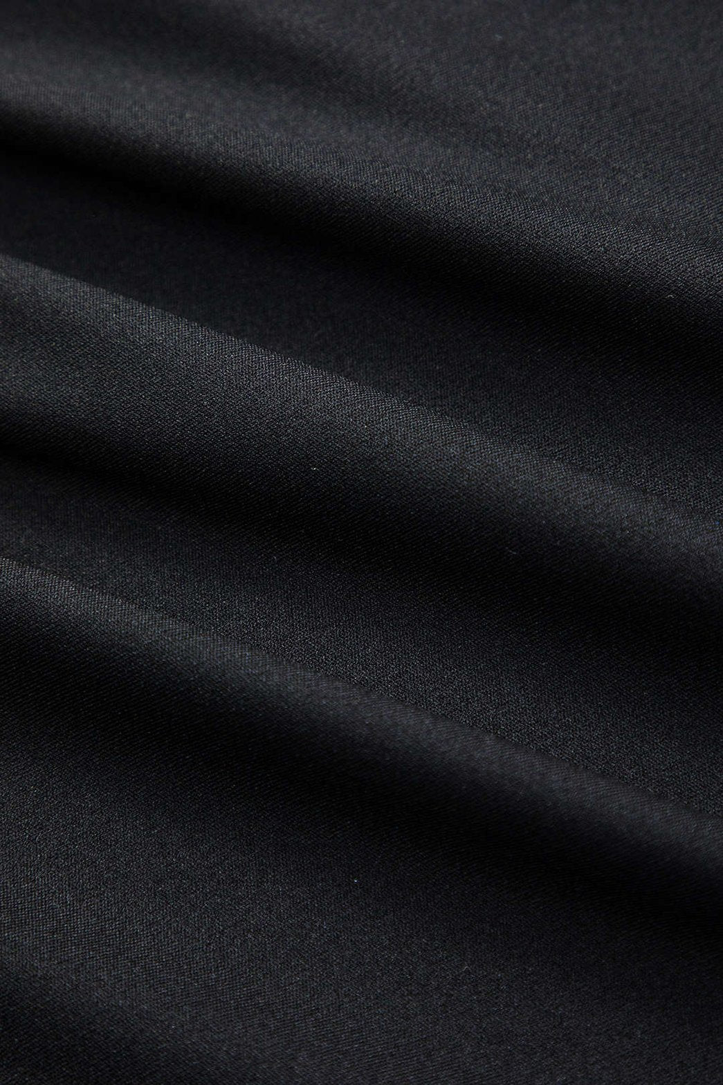 Vue arrière de la jupe plissée grâce