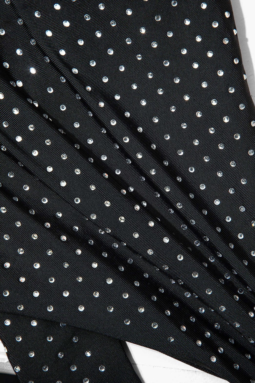 Maillot une pièce noir à pois blanc océan
