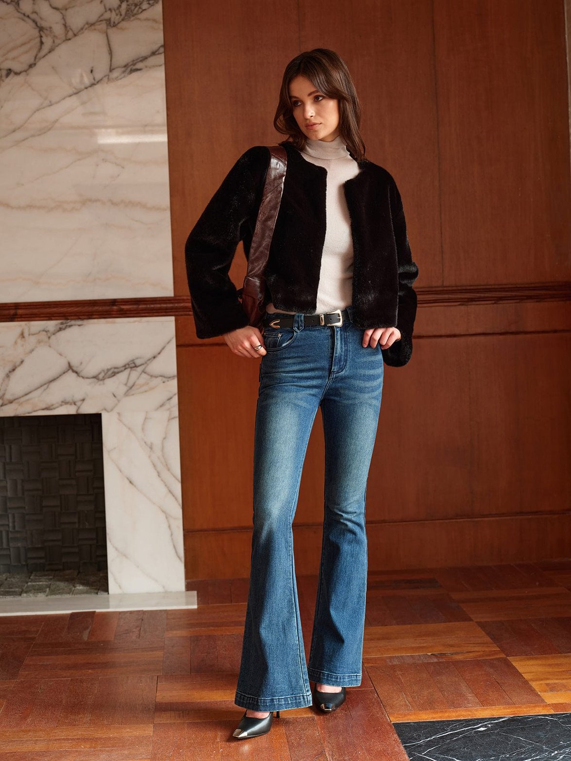 Manteau fausse fourrure détail sérénité