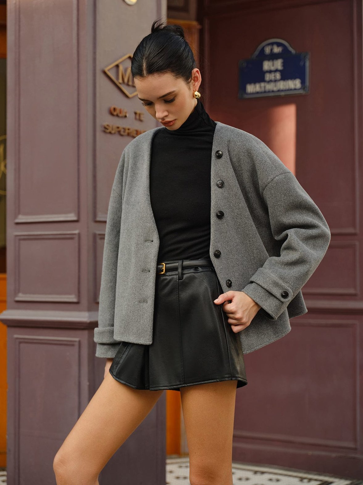 Manteau gris détail manche élégance