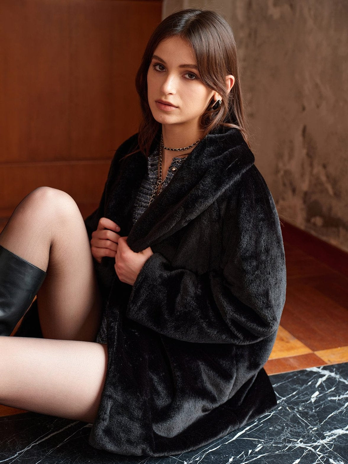 Manteau fausse fourrure noir confort luxe