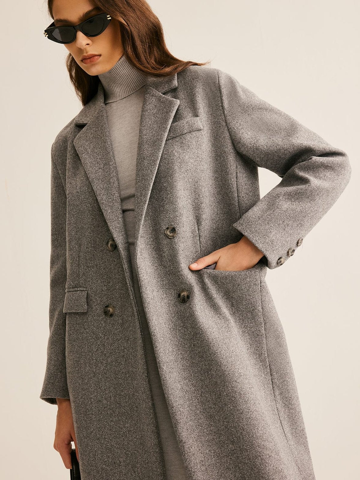 Détail des boutons du manteau élégance