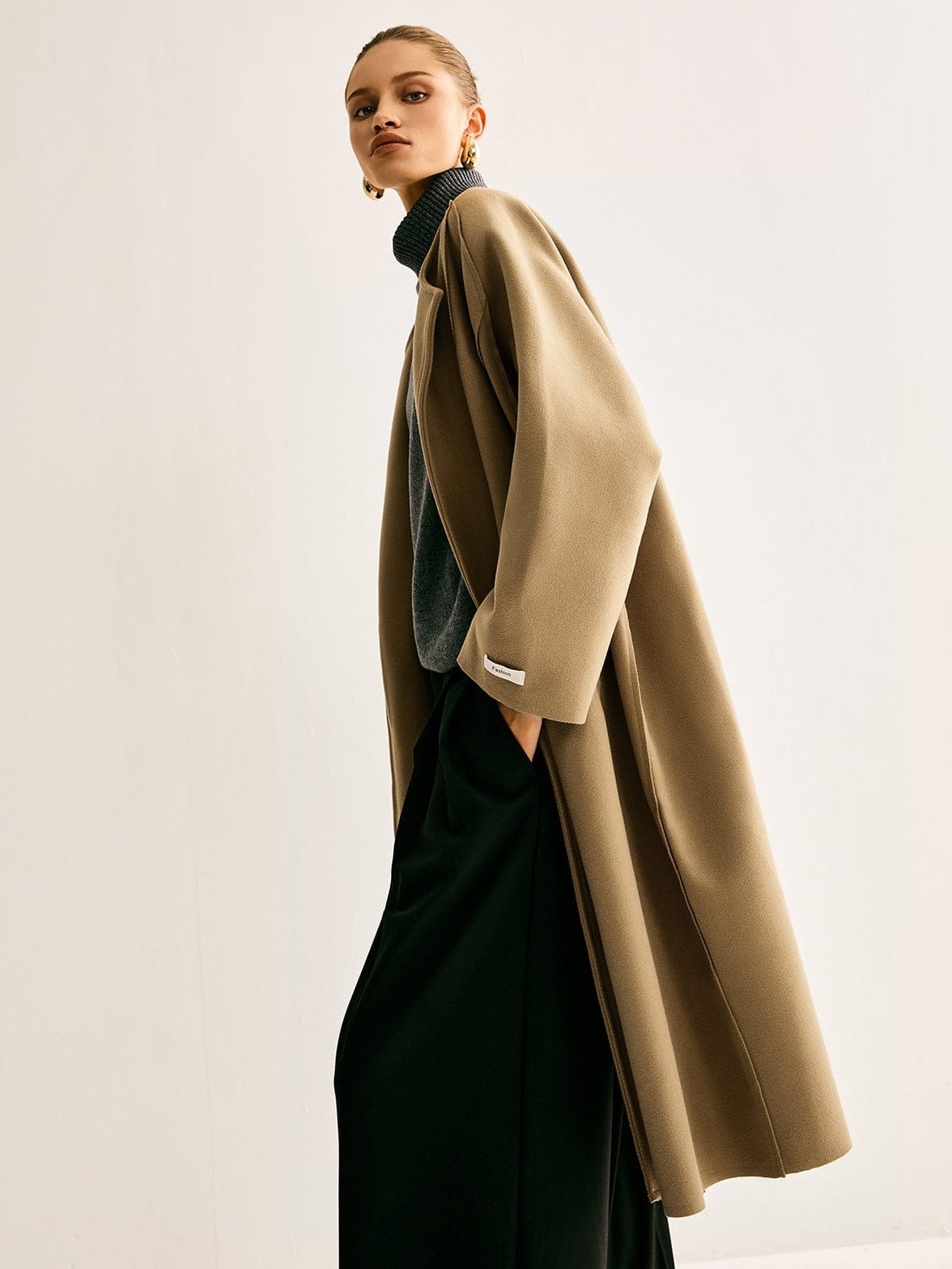 Manteau long camel détail essence
