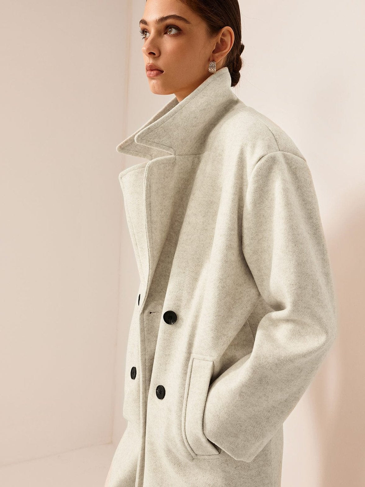 Manteau tweed détail boutonnage grâce