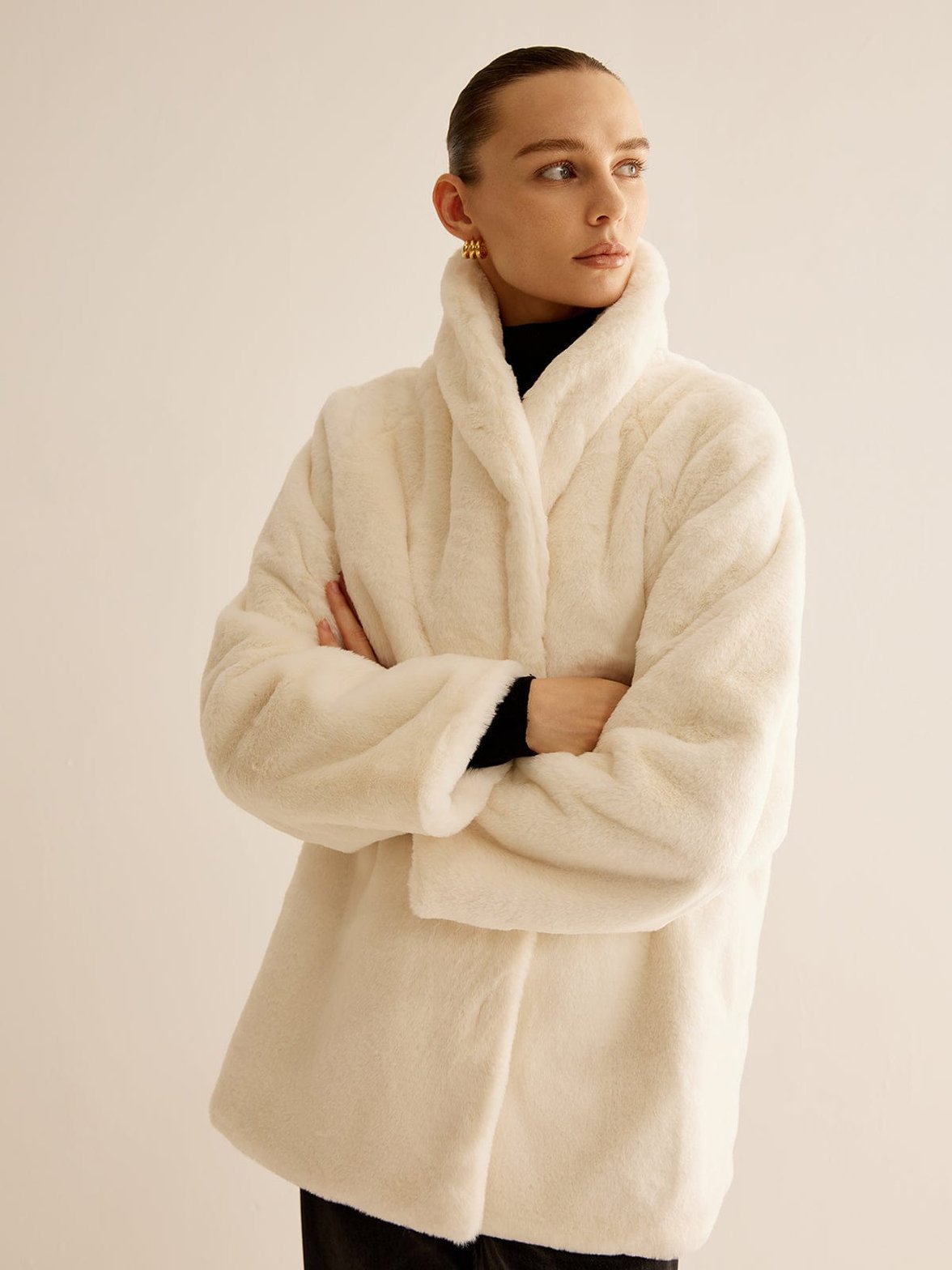 Manteau oversize fausse fourrure blanc détail manche souplesse