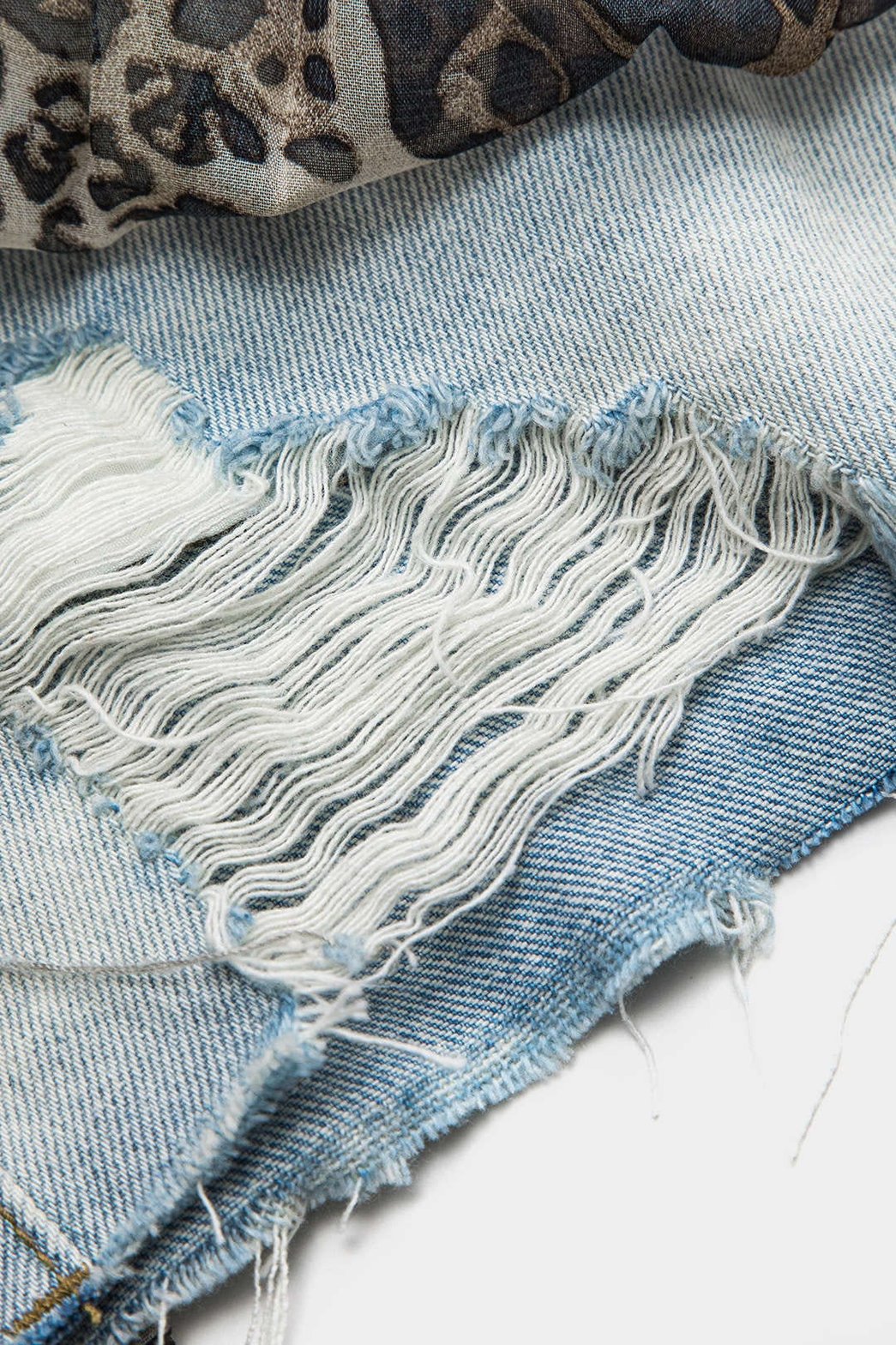 Mini jupe denim et volants léopard détail volants nuage