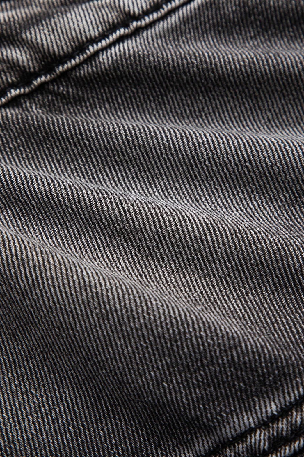 Détail des poches de la jupe en jean nuage