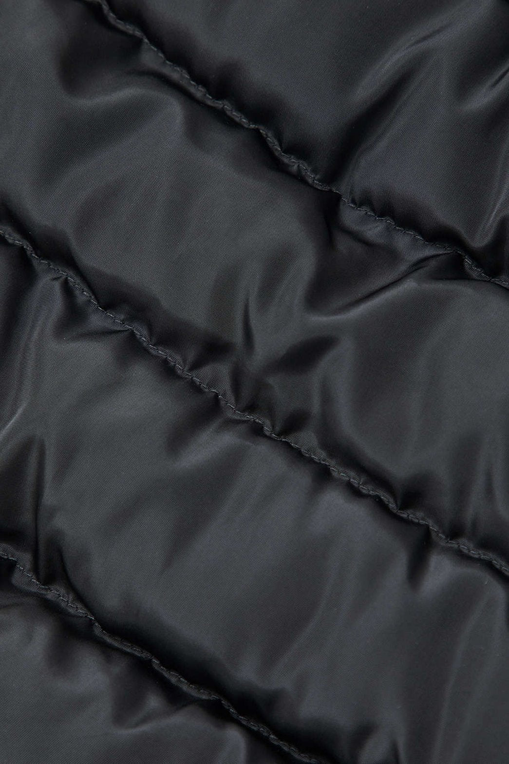 Mini jupe matelassée noire détail boutons douceur