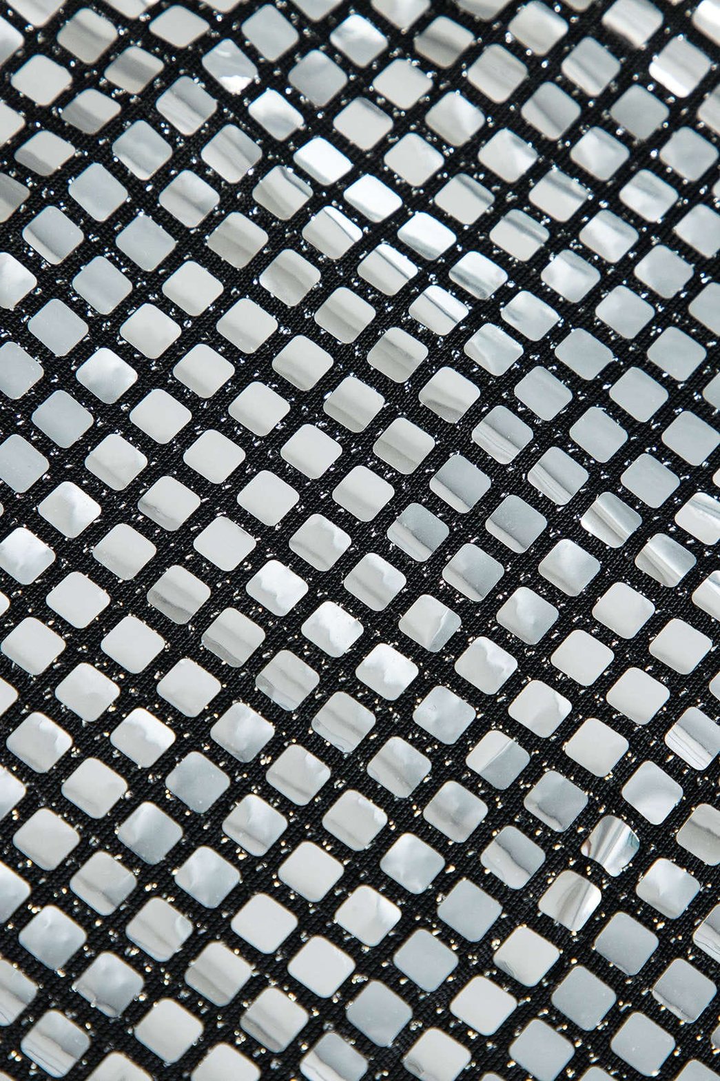 Mini jupe pailletée argentée vue de dos brillance