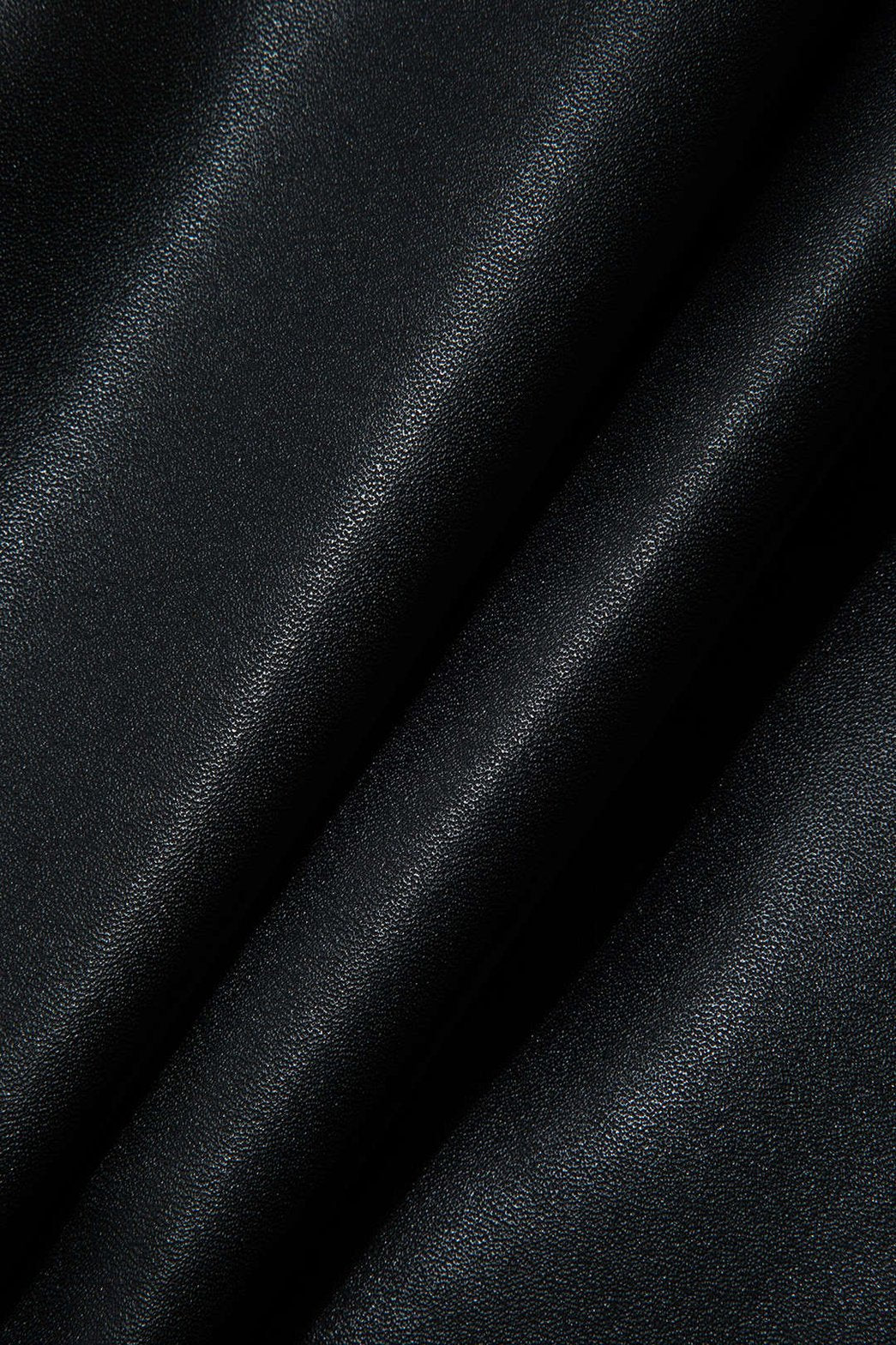 Mini jupe noire simili cuir vue de dos lune