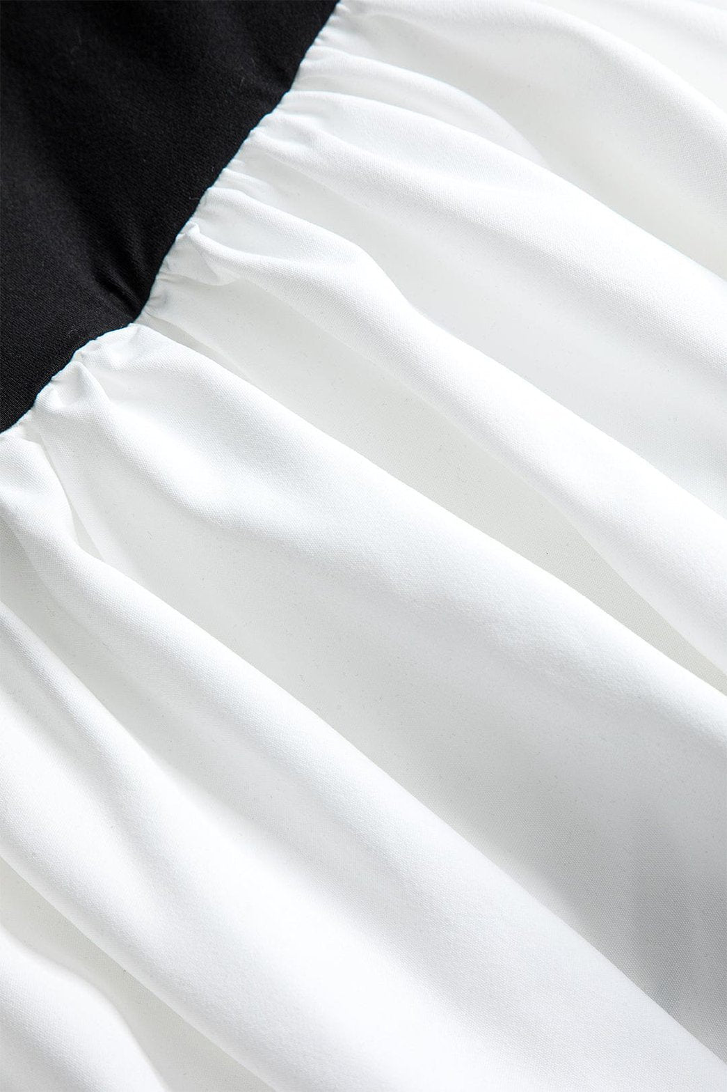 Mini robe bicolore moulante grâce