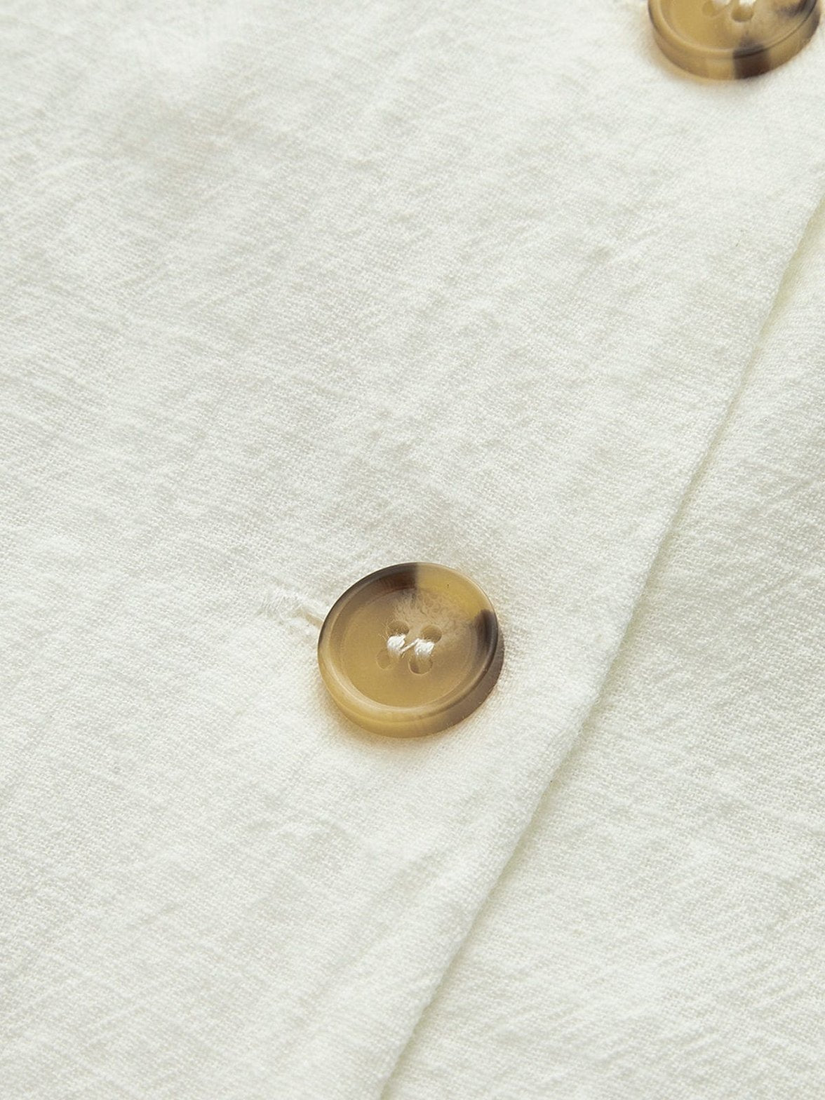 Robe d'été blanche boutons plage