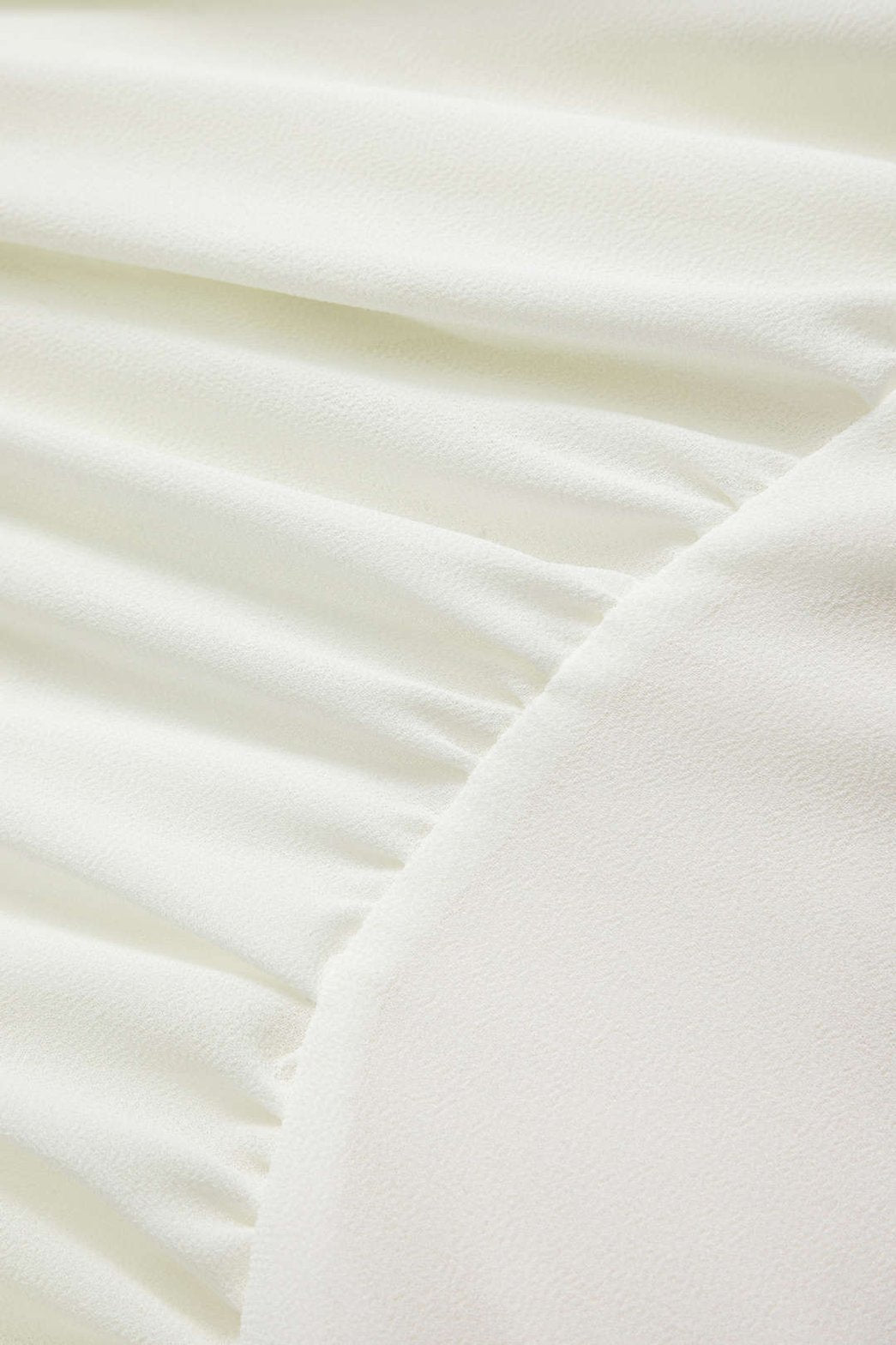 Robe mini blanche à volants détail col étoile