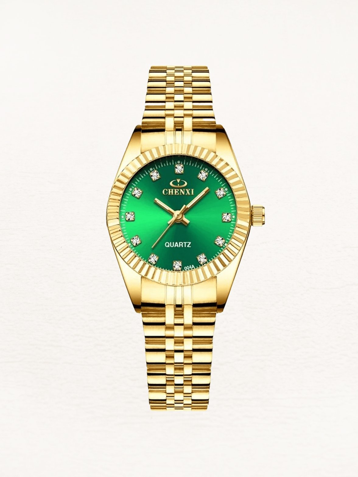 Montre élégante dorée avec cadran vert émeraude papillon