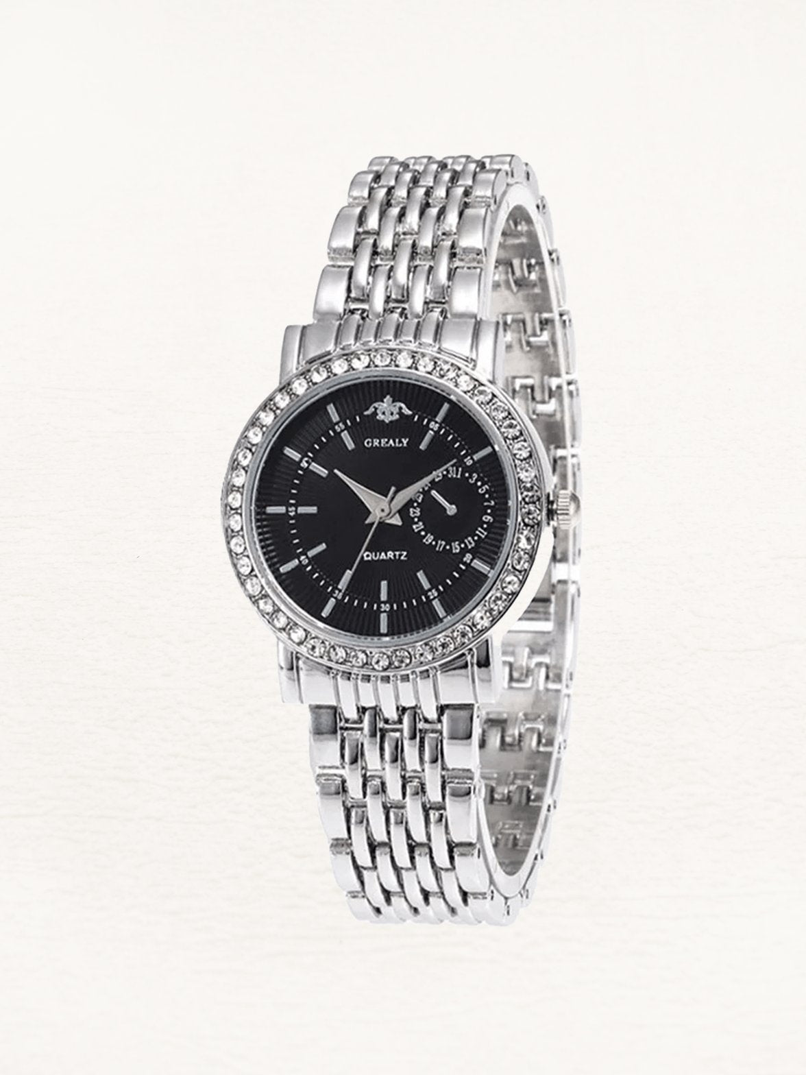 Montre femme élégante en acier inoxydable avec zircons étincelant