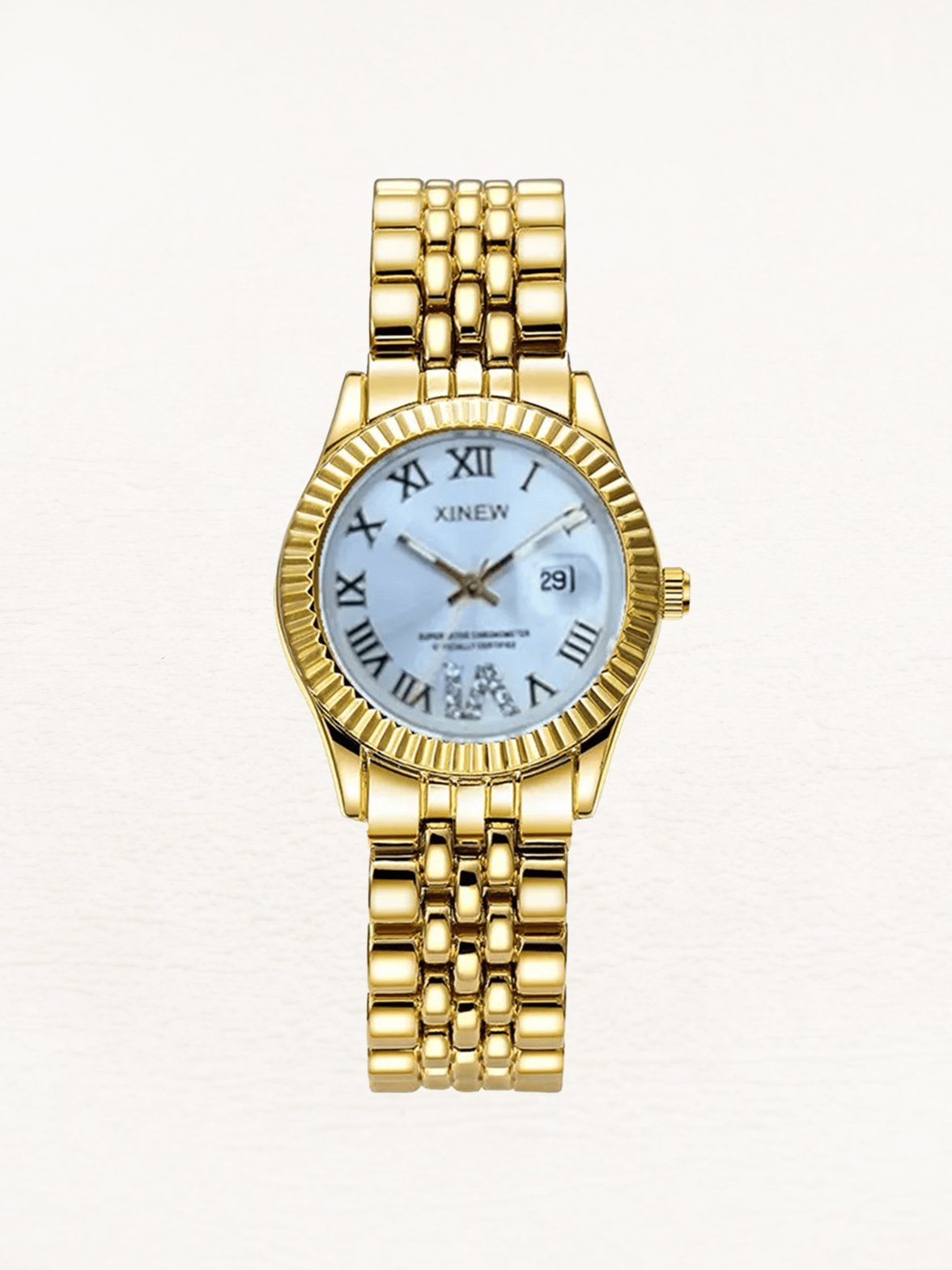 Montre luxueuse dorée avec cadran bleu ciel étincelant melody