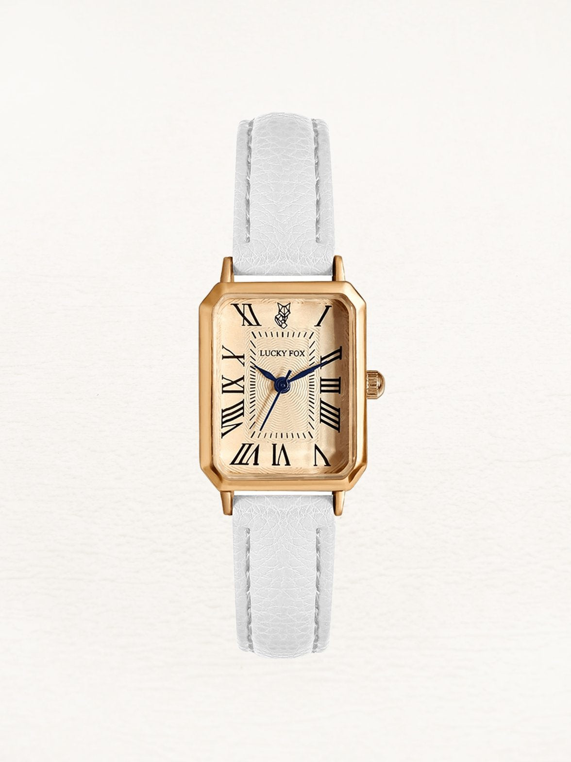 Montre carrée dorée avec bracelet blanc élégant brillant