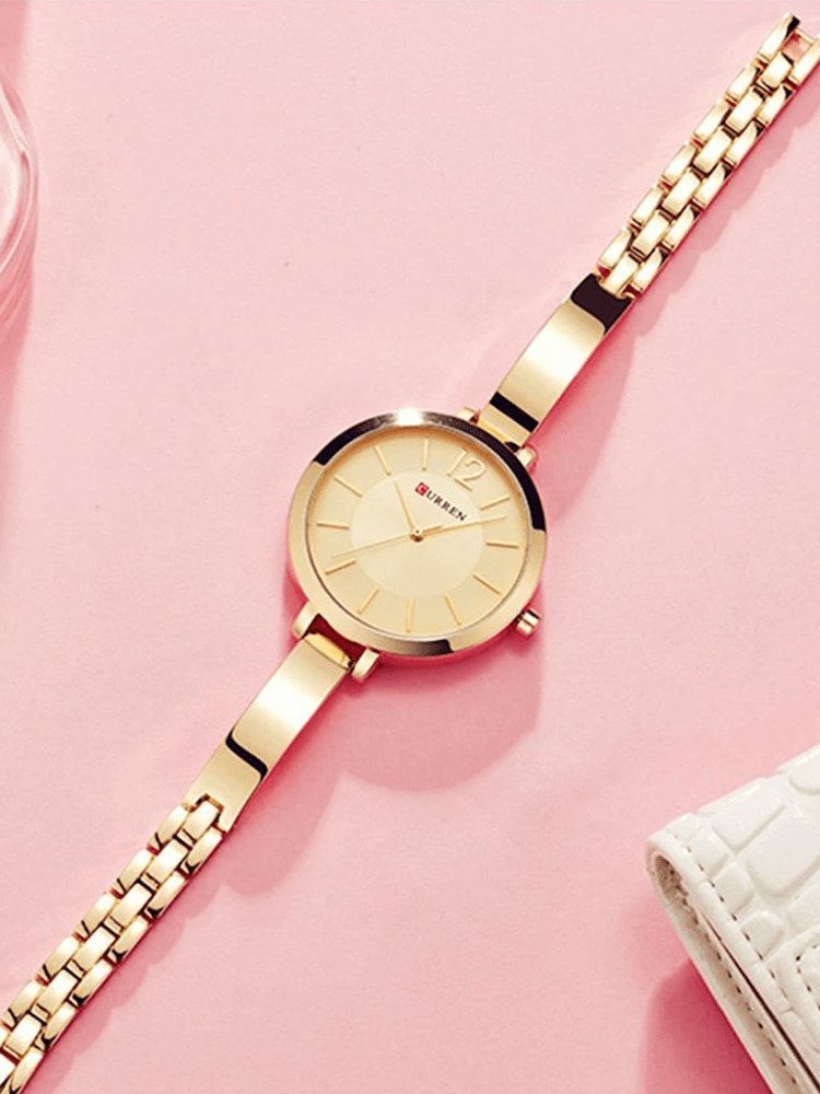 Montre fine bracelet doré - lumière