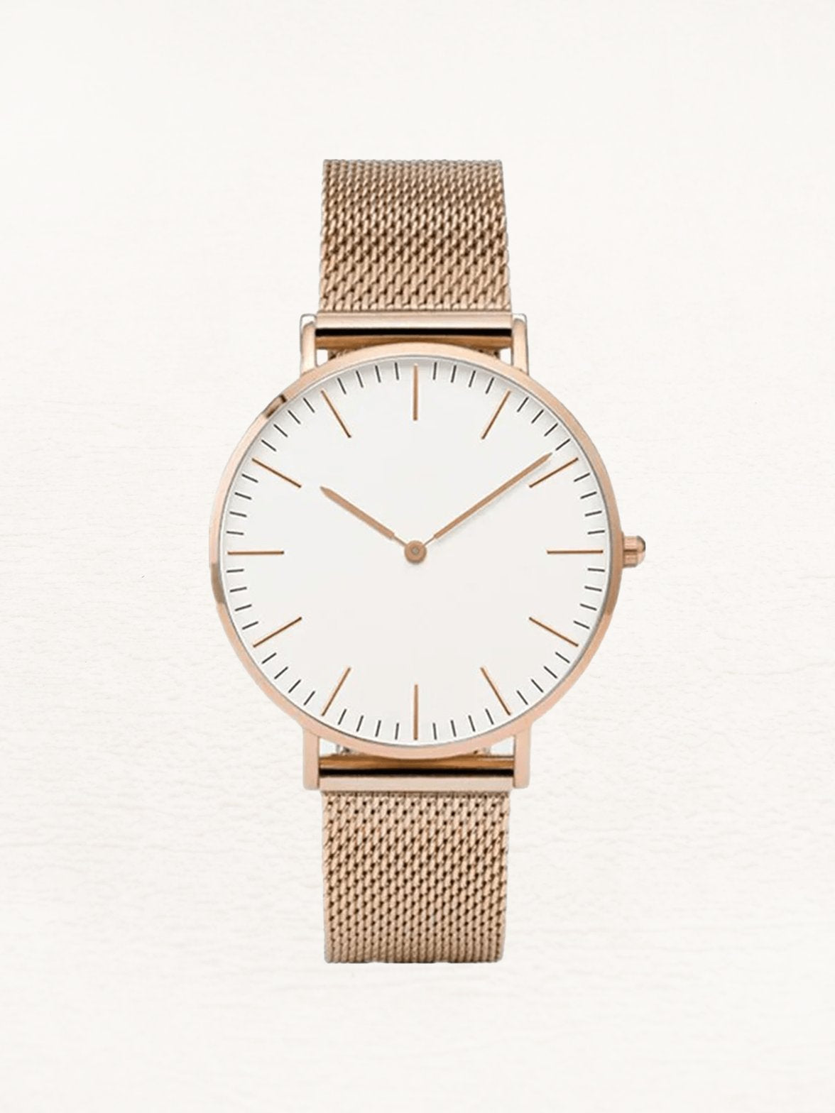 Montre élégante Daphne or rose avec cadran blanc minimaliste soleil