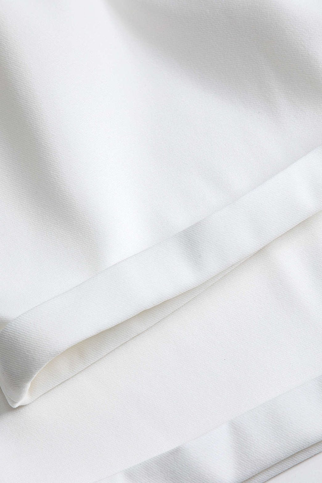 Vue arrière pantalon cargo blanc océan