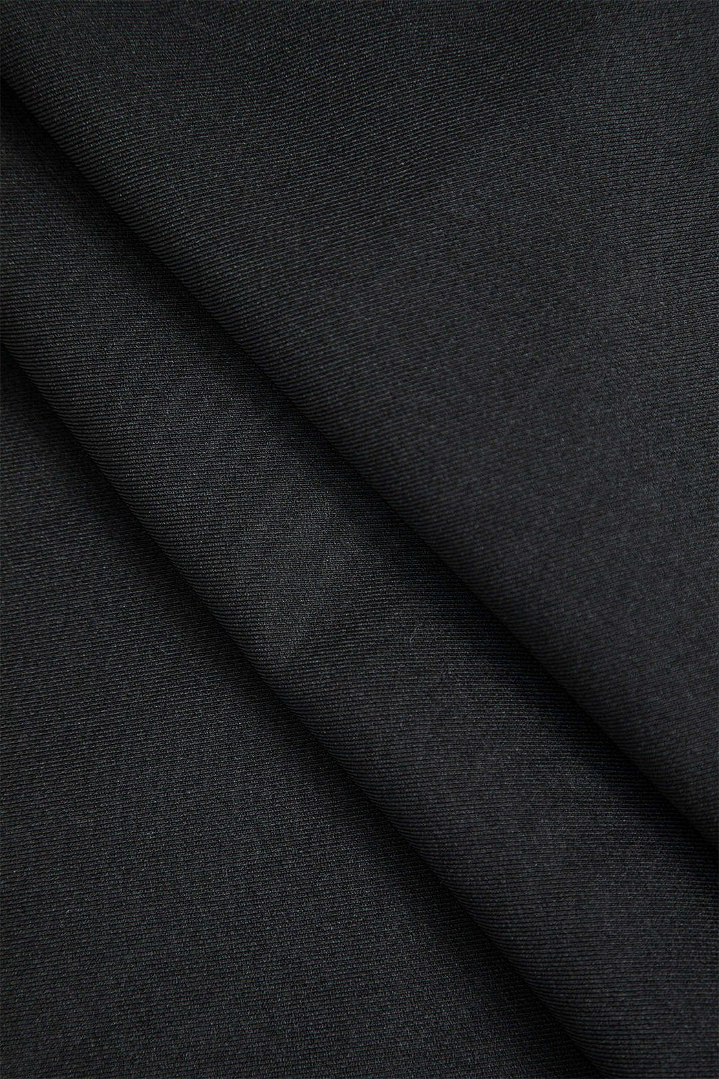 Vue de dos du pantalon asymétrique style