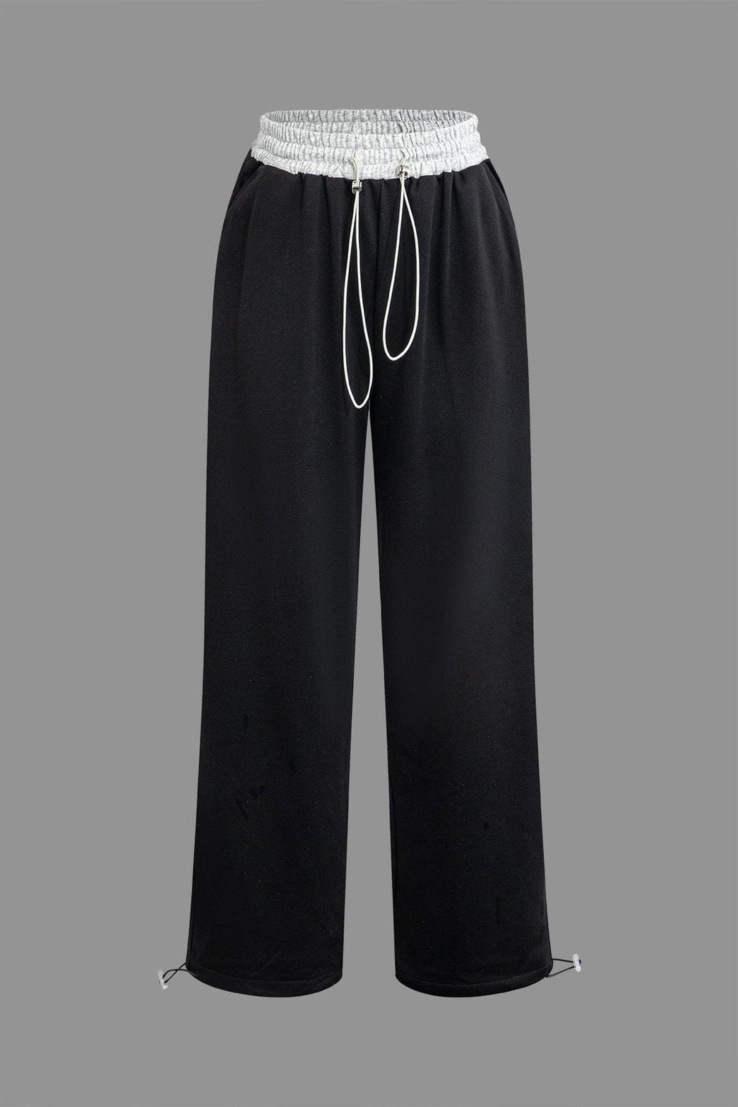 Pantalon noir large à cordon blanc élégant soleil