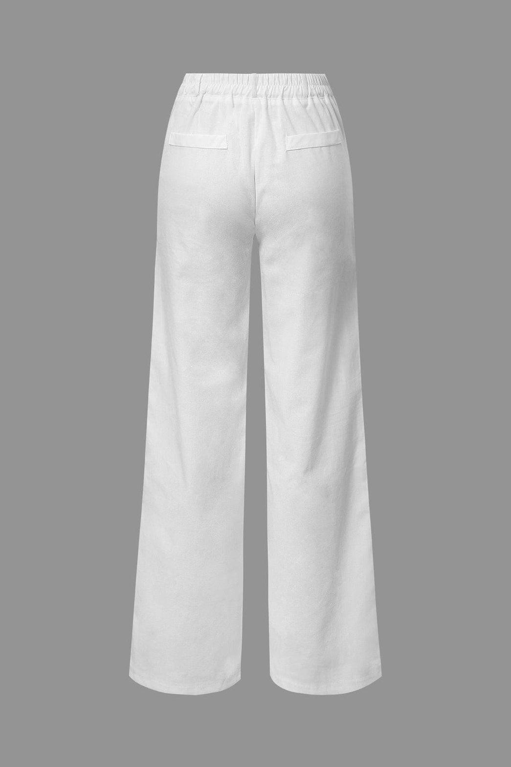 Pantalon blanc coupe ample détail brise