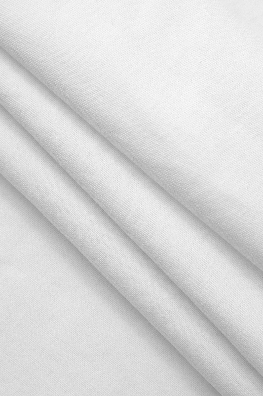 Pantalon en lin blanc porté douceur