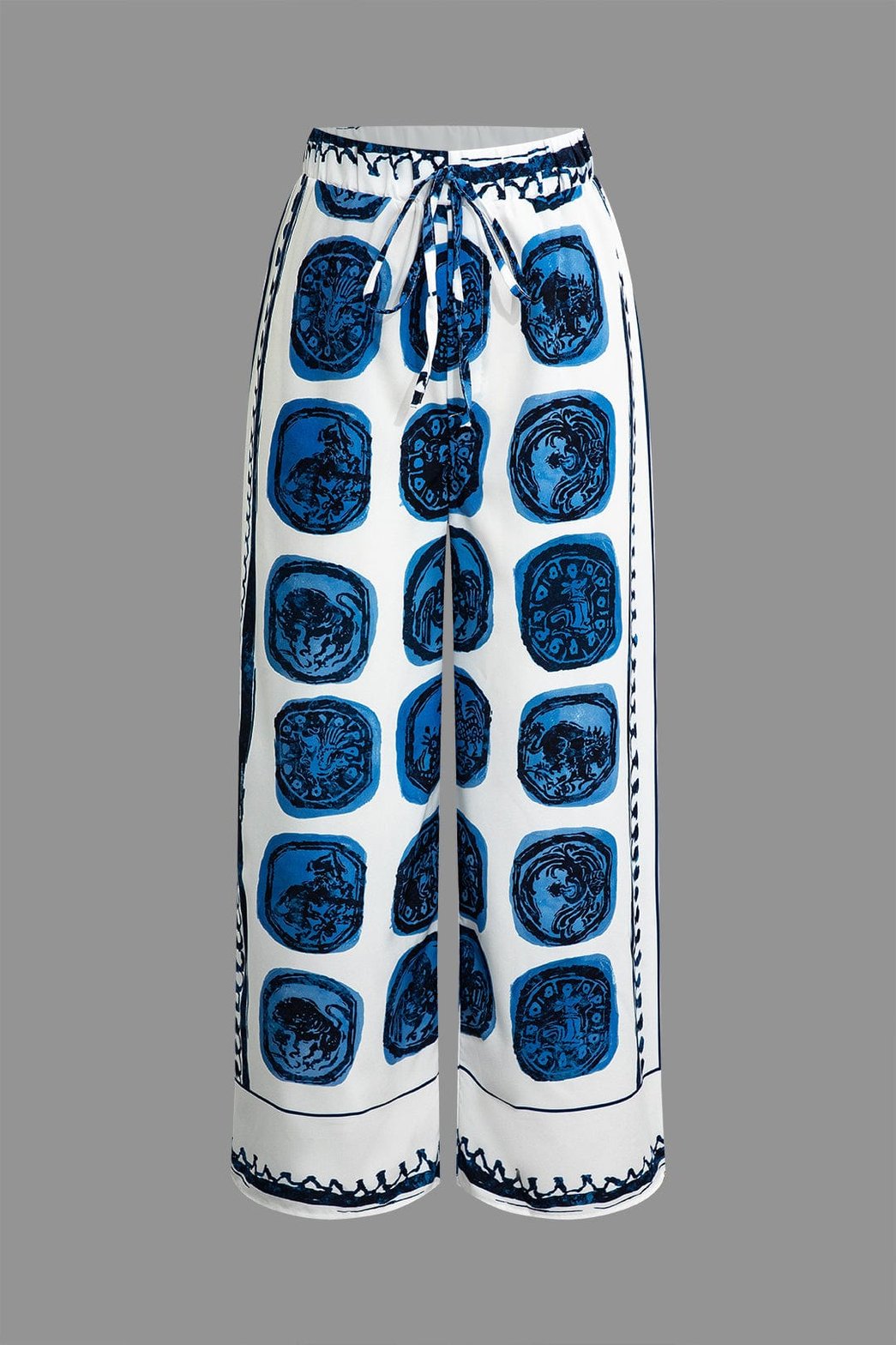 Pantalon large blanc à motifs médaillons bleus soleil