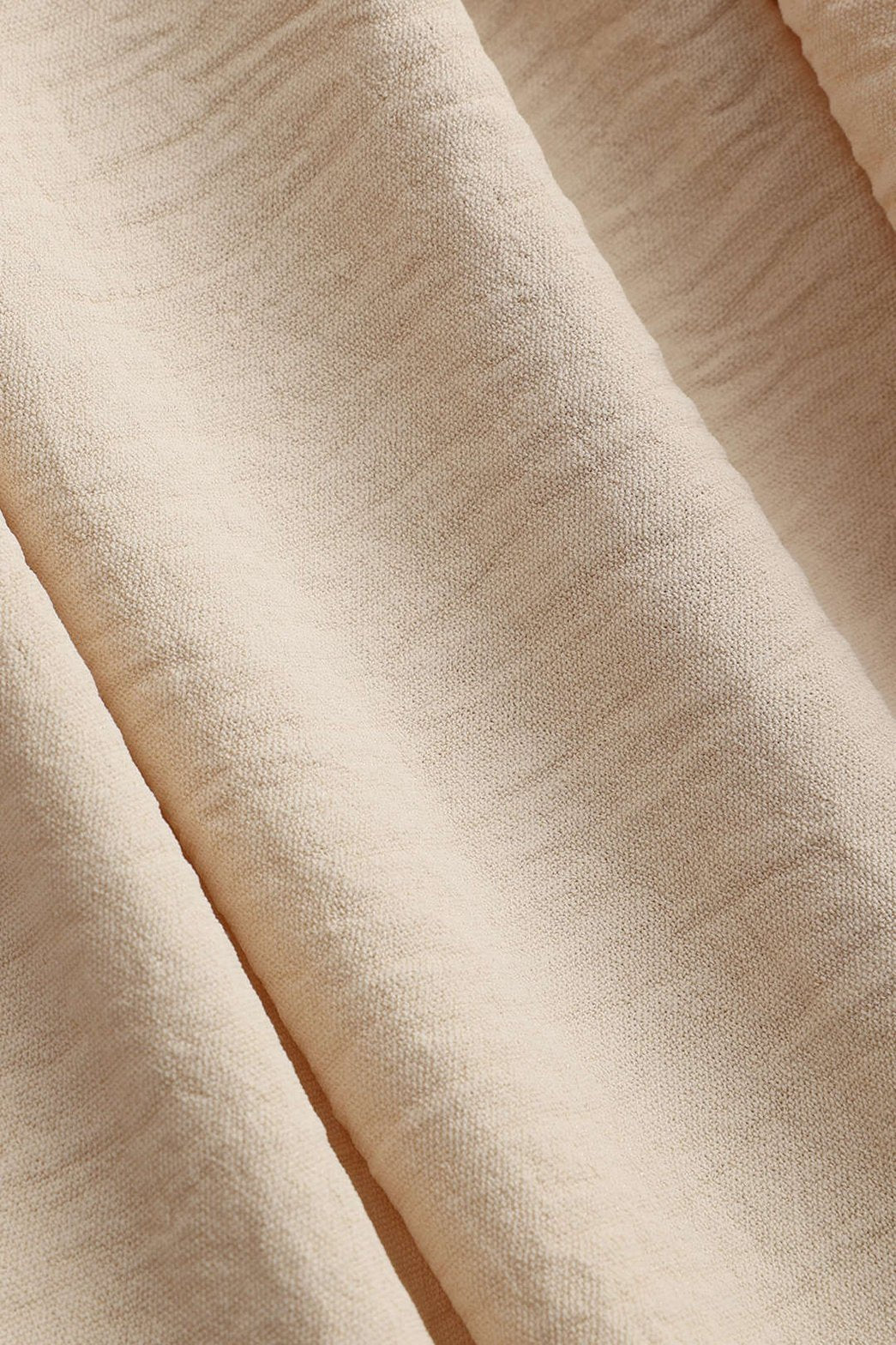 Pantalon palazzo beige fluide vue de dos douceur