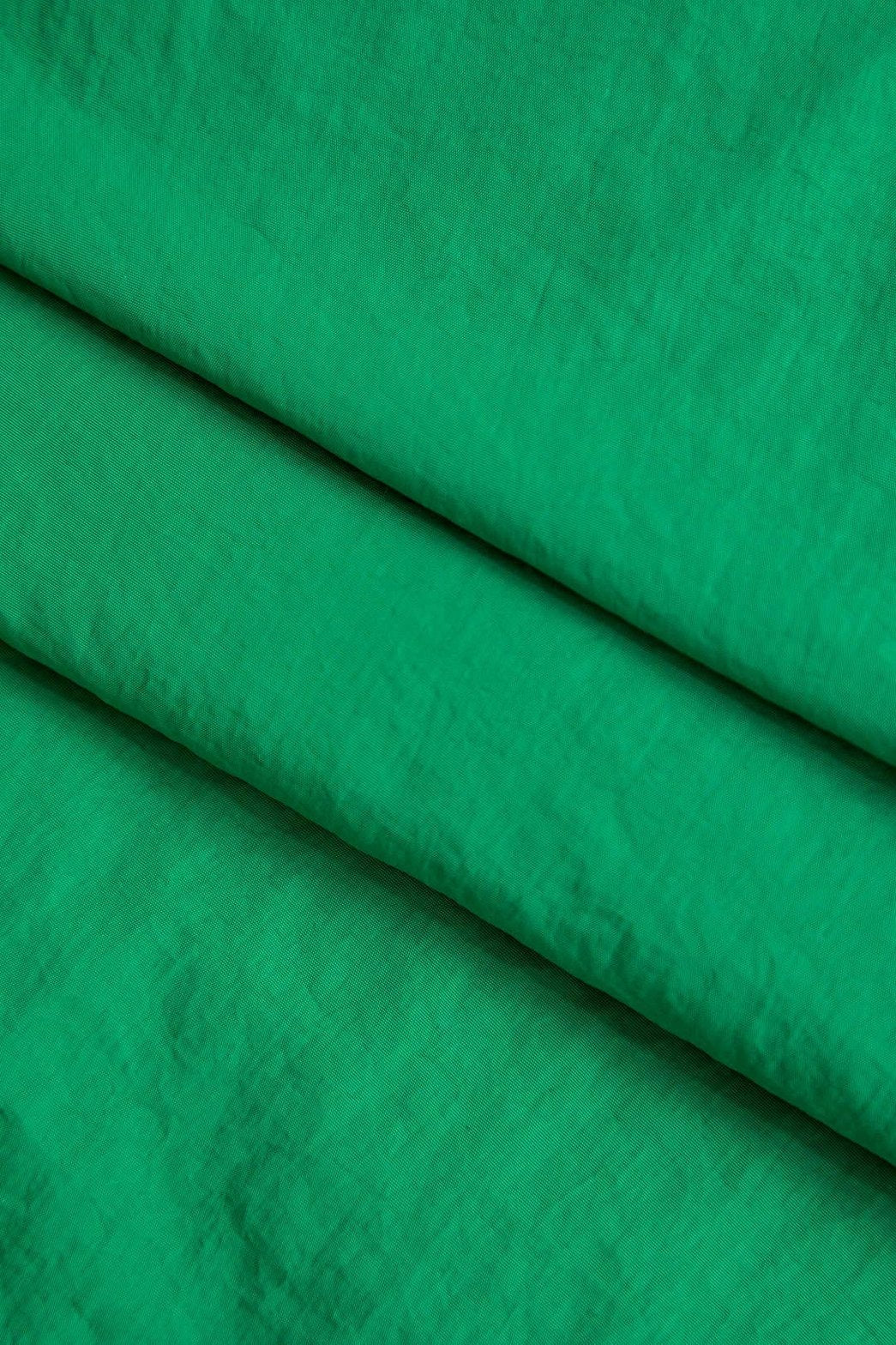 Pantalon large vert à bandes sportif