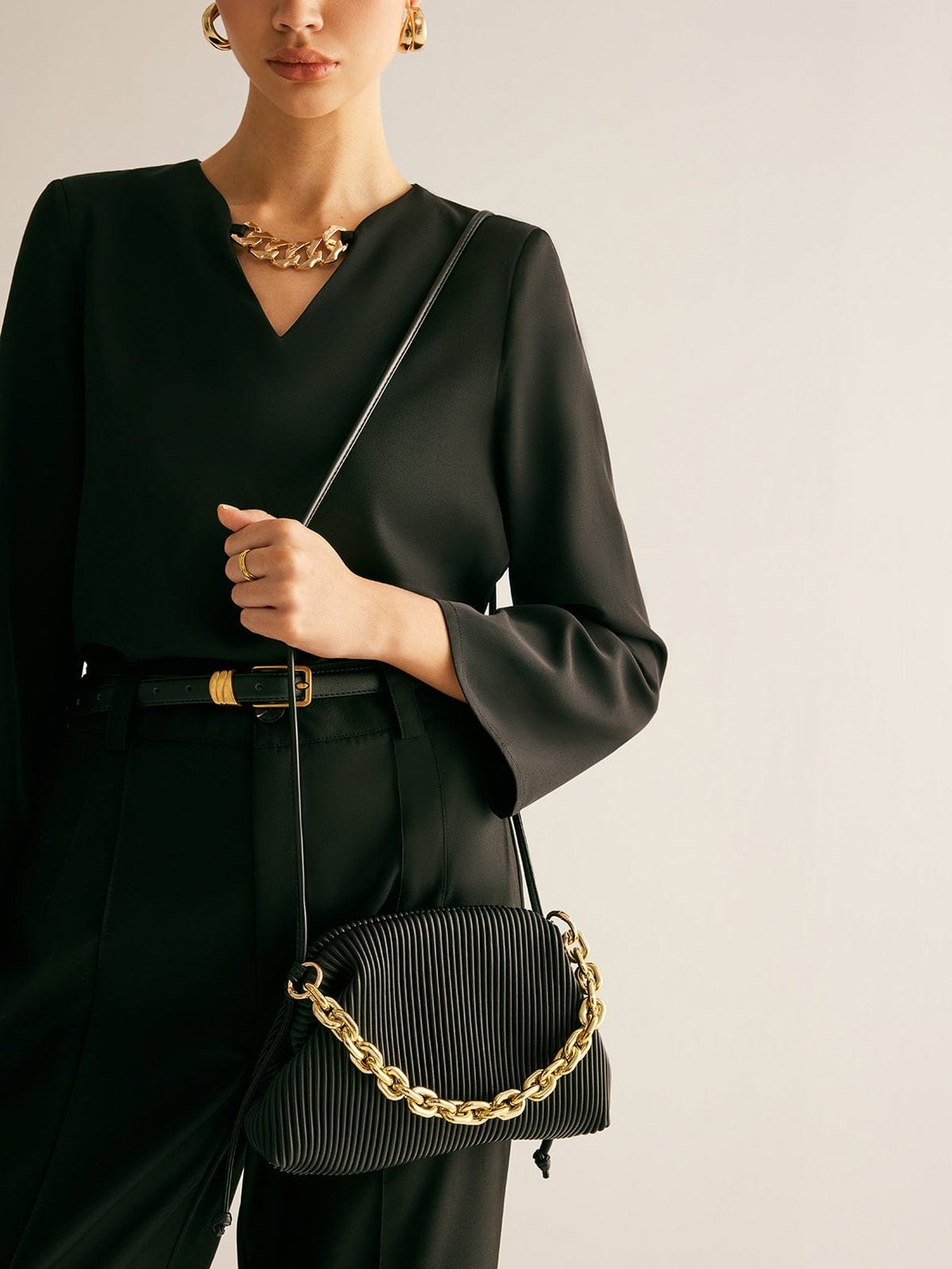 Pochette texturée noire sophistiquée douceur