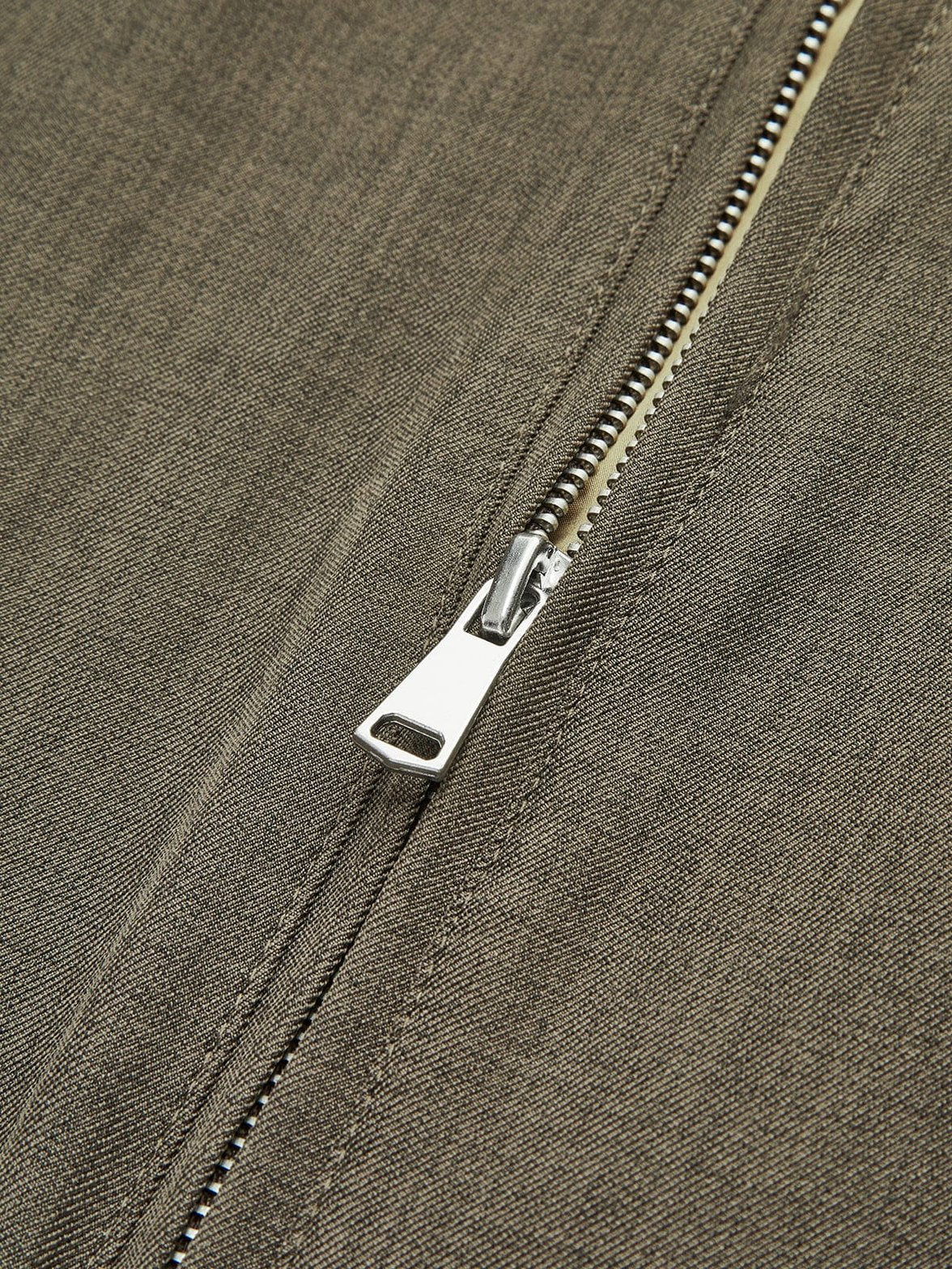 Polo rétro fermeture éclair détail poche nuage