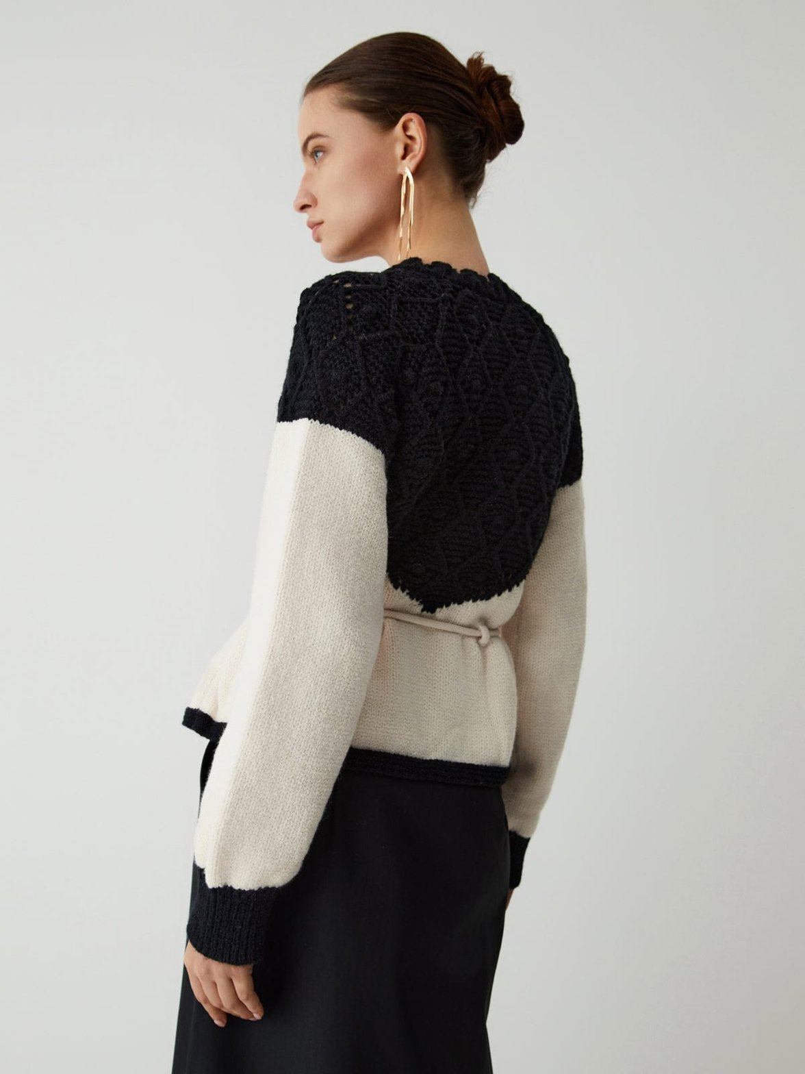 Pull en tricot bicolore avec détails texturés harmonie