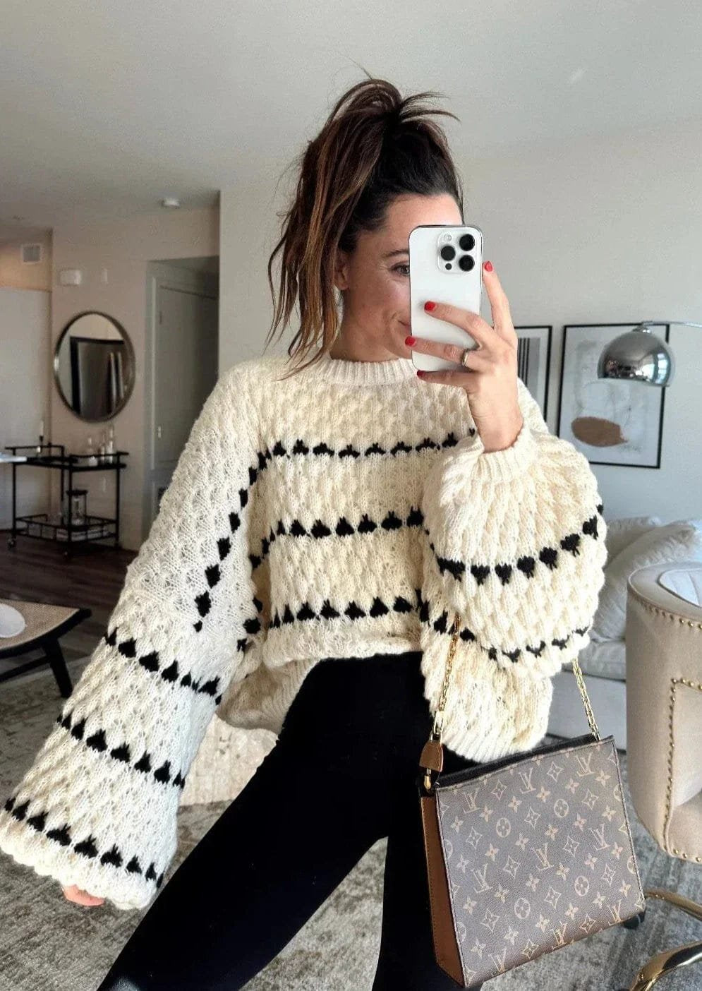 Pull élégant porté avec style doux