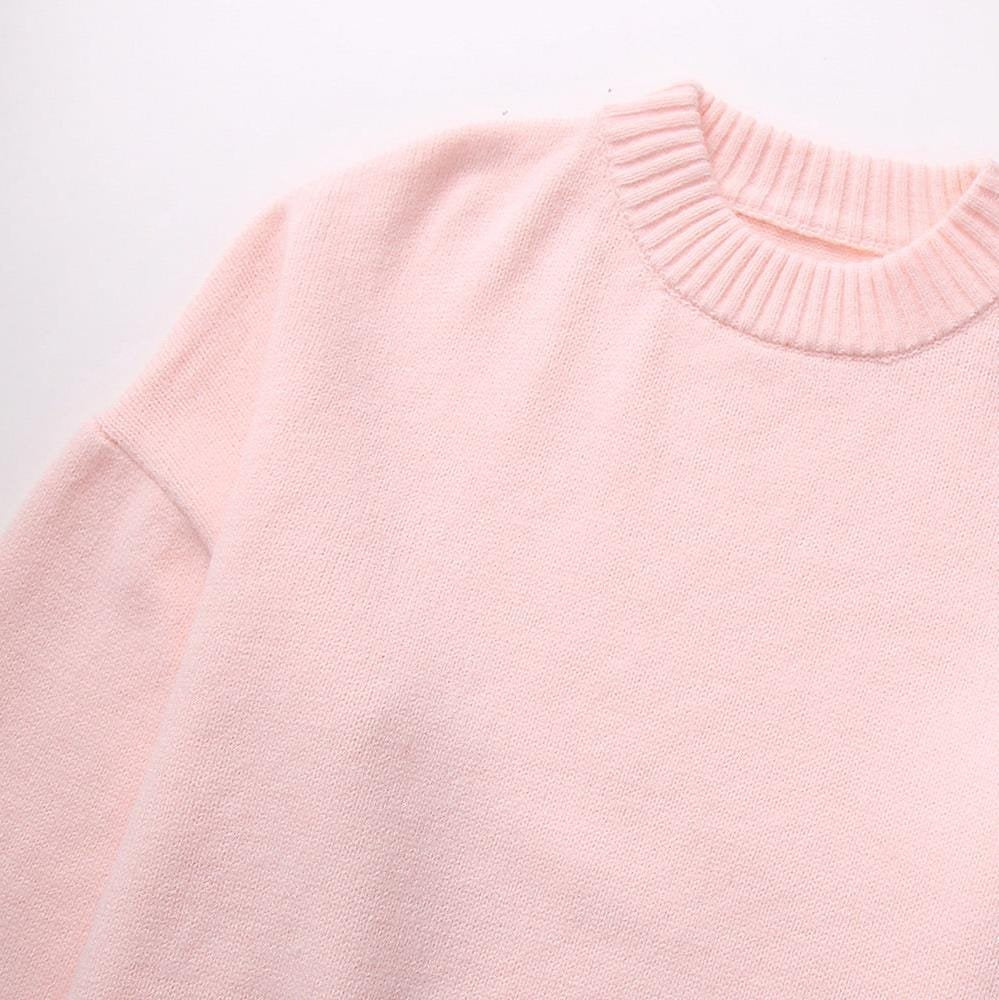 Pull oversize rose détail maille légèreté