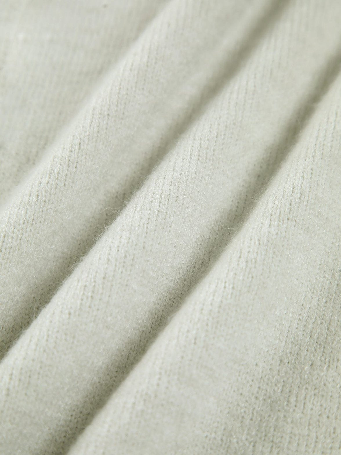 Pull tricot blanc détail maille harmonie