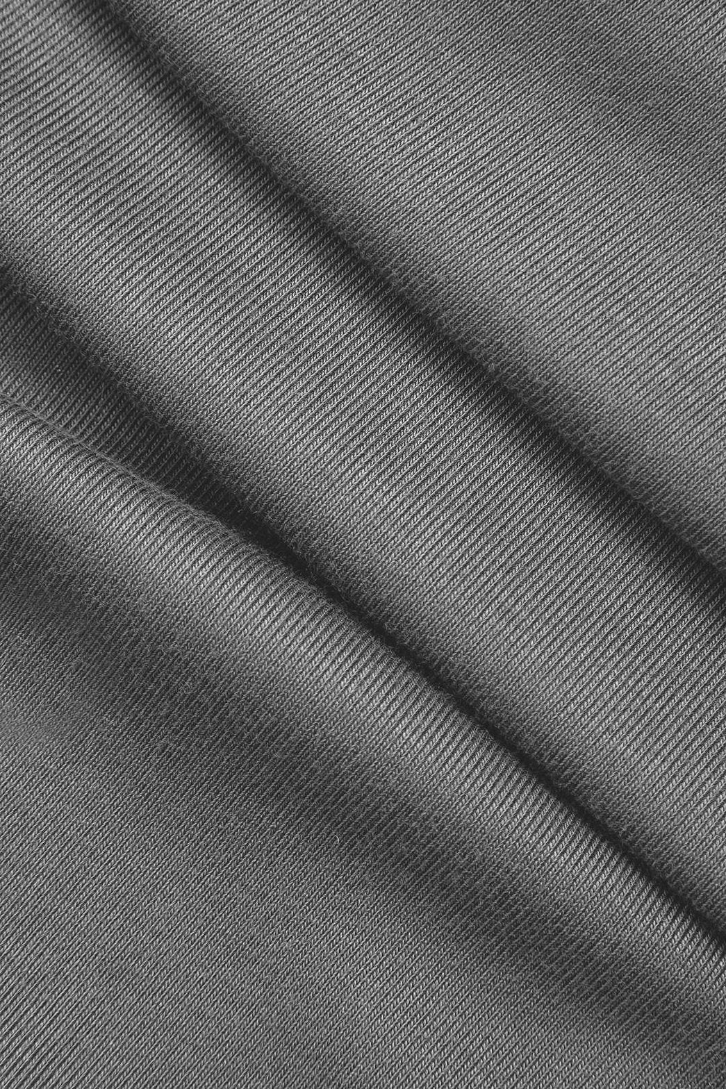 Robe longue asymétrique noire détail couture montagne