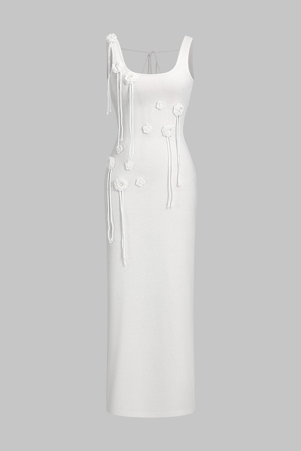 Robe longue blanche dos nu avec détails floraux étoile