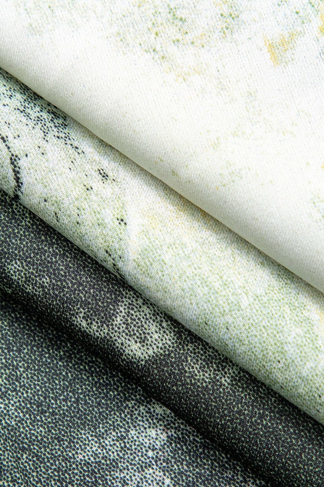 Robe longue drapée détail tissu mystère