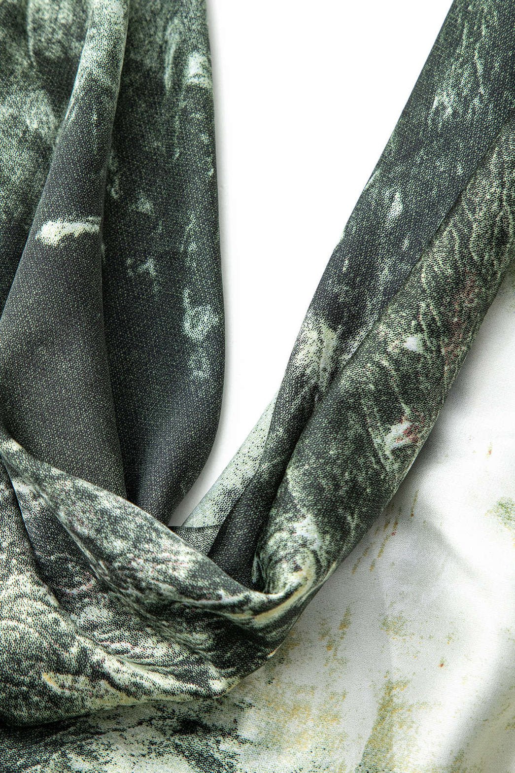 Robe longue drapée silhouette grâce