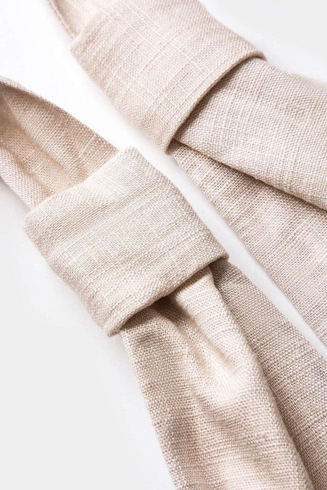 Robe mini plissée en lin beige vue de côté douceur